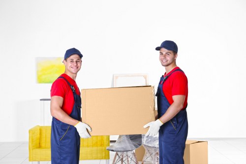 Moving team working in a West London residential street