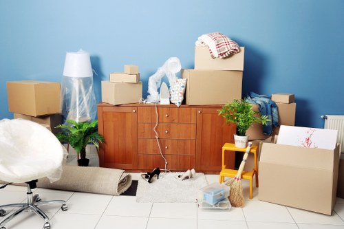 Man with a van loading household items in West London