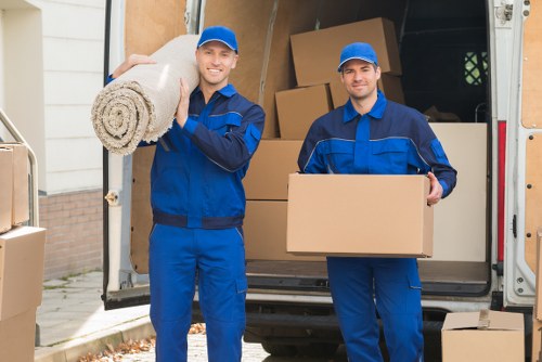 Van parked near a West London residential building for a house move