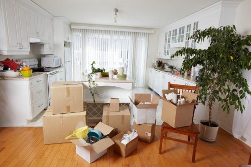Packed moving boxes ready for a West London move