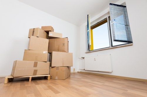 Office furniture being moved by a West London removal team