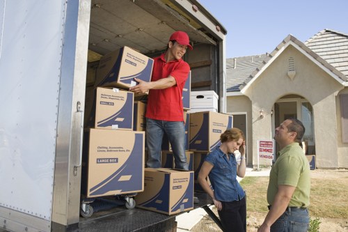 Van and moving team handling office relocation items in West London