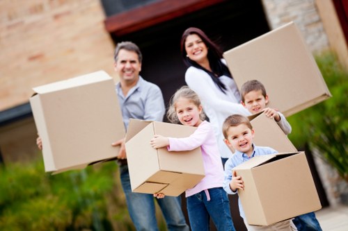 Prepared boxes and furniture ready for collection by a West London man with van