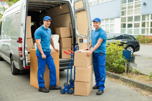 Removal van and boxes outside a West London flat