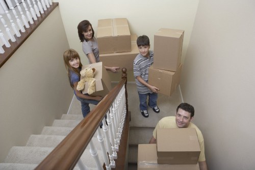 Professional movers handling access and parking challenges on a West London street